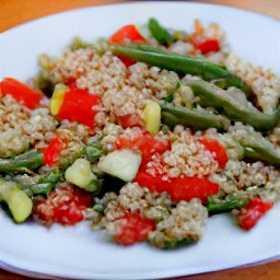 a plate of tamari flavored veggies and quinoa.