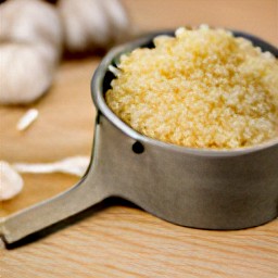 half a garlic clove that has been crushed with a crusher.