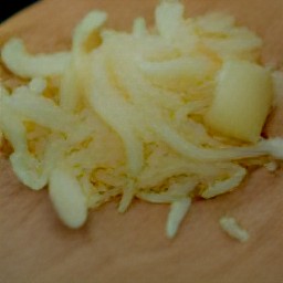 one shredded garlic clove.