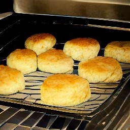 a tray of cream scones.