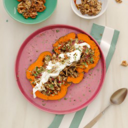 

This delicious and nutritious gluten-free, egg-free snack combines roasted sweet potatoes with celeriac coleslaw, pomegranate seeds, walnut halves, plain yogurt and red onions.