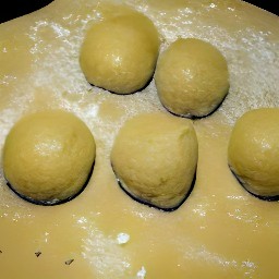 after kneading the dough until it is smooth, form it into 0.5-inch peanut balls.