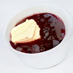 a creamy mixture of strawberry preserves and butter.