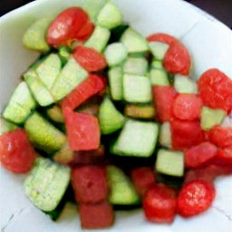 a salad made with cherry tomatoes, cucumbers, sweet onions, green bell peppers, lemon juice, balsamic vinegar, salt and black pepper.