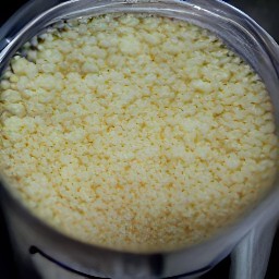 the food processor will output minced garlic.