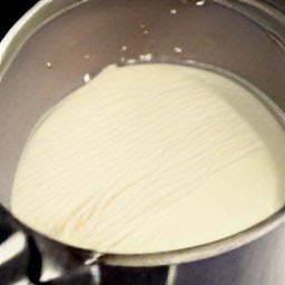 the white chocolate will melt in the saucepan after being heated for two minutes.