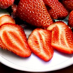 after hulling the strawberries, slice them.