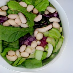 a bowl of navy beans, onions, and baby green slices that have been combined.