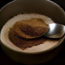 a bowl of brown sugar, coconut milk, pumpkin pie spice, ground nutmeg, and salt.