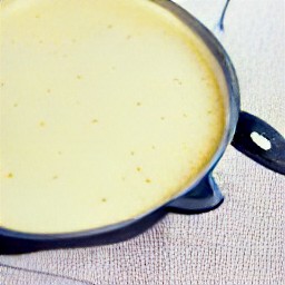 a cornmeal pudding with custard.
