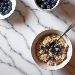 

Oatmeal is a delicious and nutritious gluten-free, eggs-free, nut-free, soy-free breakfast/snack made with rolled oats and whole milk topped with fresh blueberries.