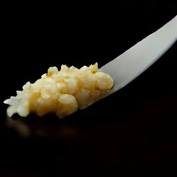 a peeled and minced garlic clove.