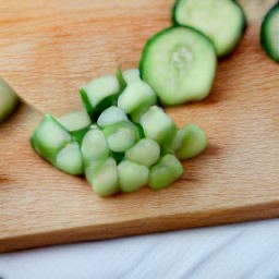 diced cucumbers and chopped spearmint.