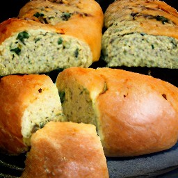 the pan of herbs and cheese bread is removed from the oven.