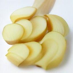 garlic that has been peeled and sliced.