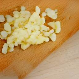 garlic that has been peeled and chopped.