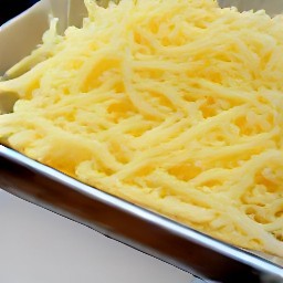 the output is shredded mozzarella cheese.