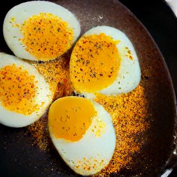 a dish of stir-fried eggs with coriander.