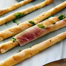 strips of veggie prosciutto wrapped around breadsticks.