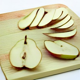 two pear halves, each with multiple slices.