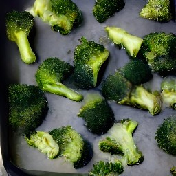 the broccoli mixture is placed on a baking sheet and baked for 12 minutes. then the baking sheet is removed from the oven and the heat is turned off.