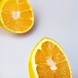 the orange is cut in half.