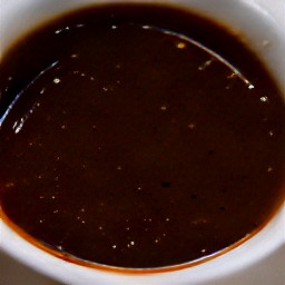 a dressing made from the melted butter, chopped shallots, chopped thyme leaves, salt, and black pepper.