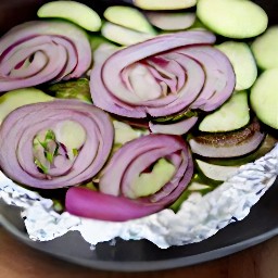 a dish of baked veggies.