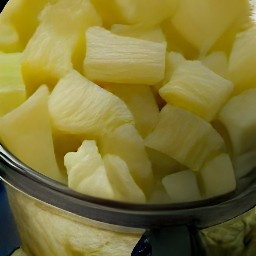 the output is a mixture of pineapple tidbits and pineapple juice.