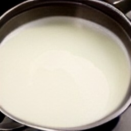 milk that has been heated in a saucepan for 2 minutes.
