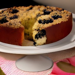 the cake is transferred to a platter.