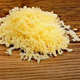 the output is finely shredded parmesan cheese.