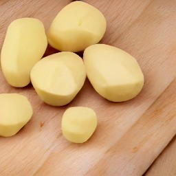 the potatoes peeled with a peeler.