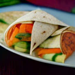 the tortilla rolled out and cut in half.