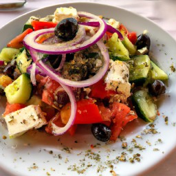

This Greek Tomato and Cheese Salad is a delicious, eggs-free, nuts-free, soy-free side dish. Blending the flavors of Greek salad dressing with feta cheese and vegetables like tomatoes, black olives and onions atop a bed of bread - this light recipe will delight your taste buds!