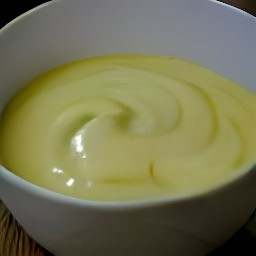 a smooth mixture of yogurt, whole milk, and vanilla extract.