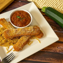 

This delicious, nuts-free side dish of breaded zucchini fingers is made with eggs, breadcrumbs, parmesan cheese and zucchini served with spaghetti sauce.