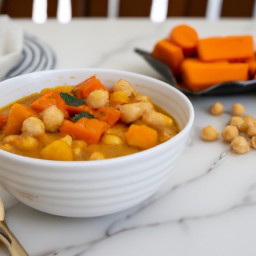 

This vegan and nut-free European sweet potato stew is light yet filling, made from nutritious ingredients such as onions, sweet potatoes, acorn squash, carrots, chickpeas and tomatoes with added raisins for sweetness.