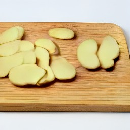 ginger that has been cut into thin slices.