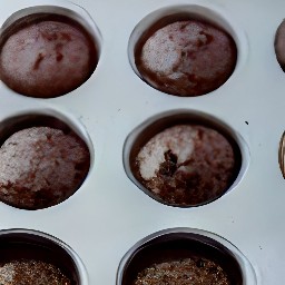 the cupcake mixture put in the muffin pan and it should be 2/3 full.