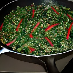 a skillet with olive oil, garlic, and swiss chard.