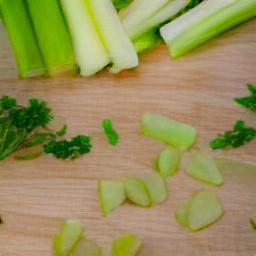 chopped parsley, sliced apples, and celery sticks.