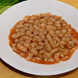 the food is transferred from the cooking surface to a plate.