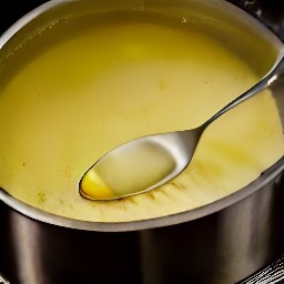 a casserole dish with lightly greased sunflower oil and melted cheese.