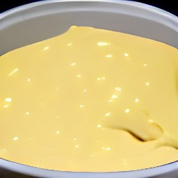 a pot of cheesy vegetable soup.