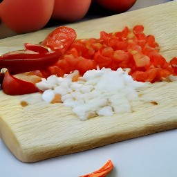 chopped green bell peppers, peeled onion and garlic, diced rosemary, and diced tomatoes.