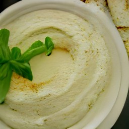 the food is transferred from the cooking surface to a plate.