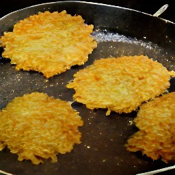 after flipping the carrot latkes, fry for another 2 minutes.