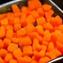 the carrots roasted and seasoned after being placed in a roasting pan and baked for 45 minutes.