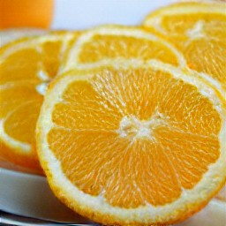 an orange slice on a serving plate.